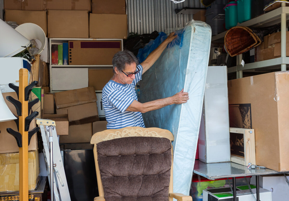 A man packing his storage unit in Pearland, TX